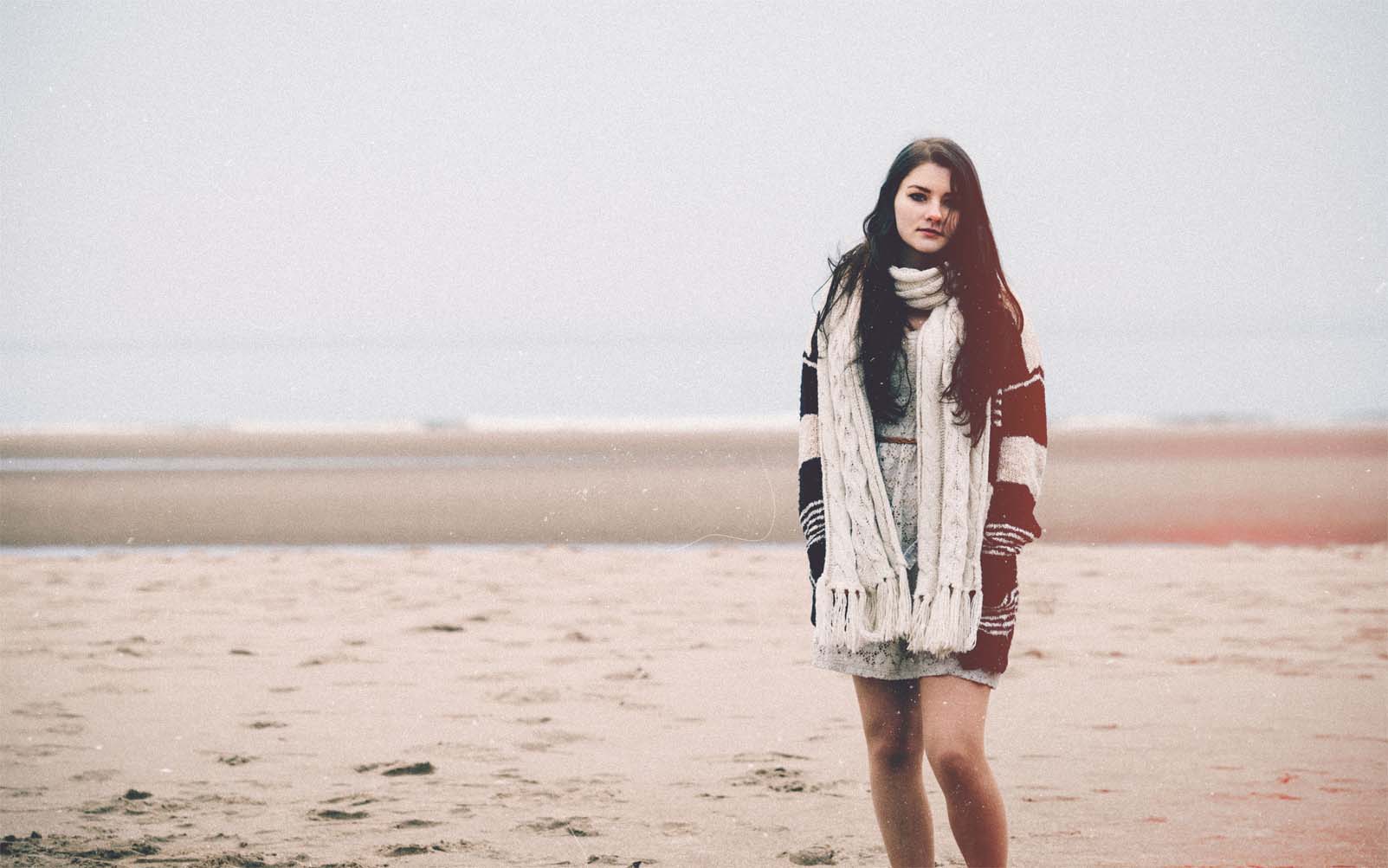 Woman standing on middle of road