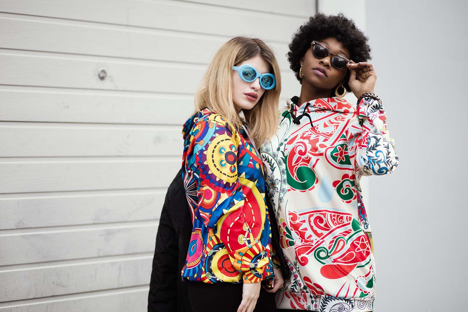 Standing and chatting outside building