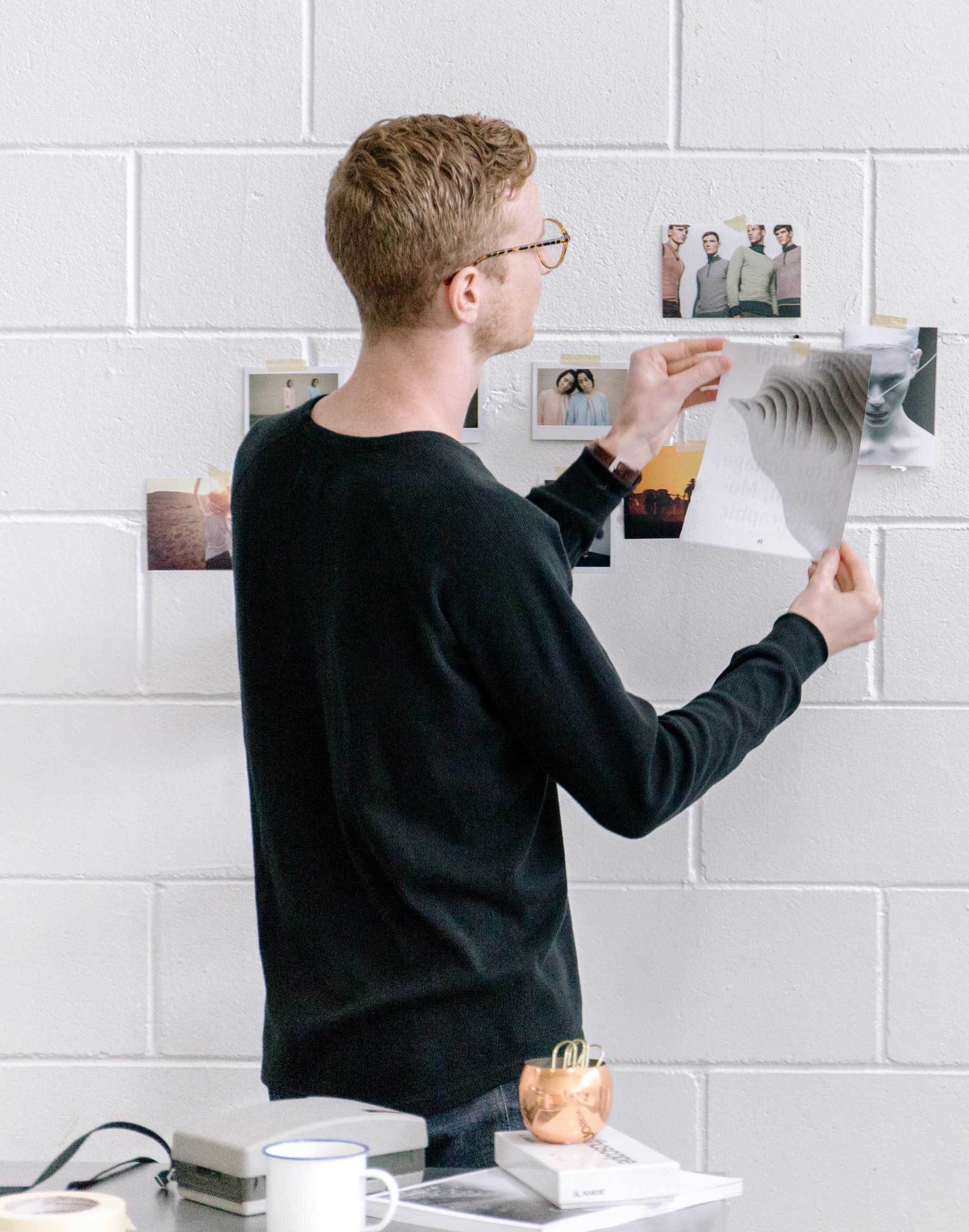 Pensive male graphic designer working on freelance