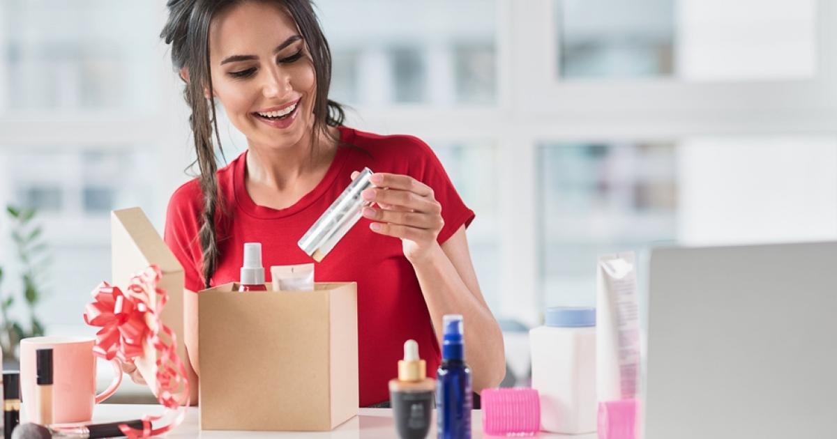 Woman placing sticky notes on wall